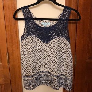 Printed crochet sleeveless blouse